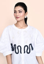 Load image into Gallery viewer, WHITE FINE POPLIN SHIRT WITH STYLISED SLEEVES AND DENIM PEARL EMBELLISHMENT
