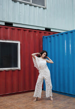 Load image into Gallery viewer, CRUNK IVORY ASYMMETRICAL FLORAL LACED TOP

